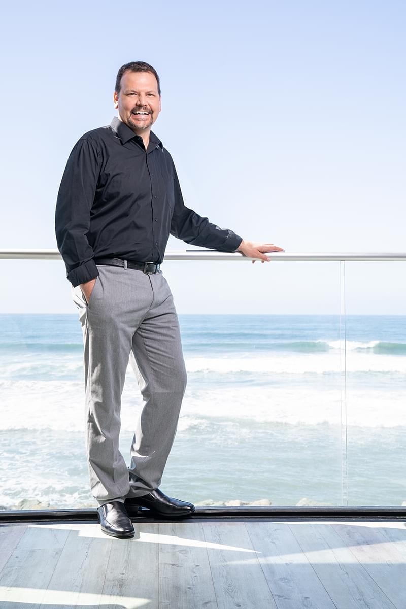 Keri Samiec standing in his condo during a photoshoot on the west coast for a client.